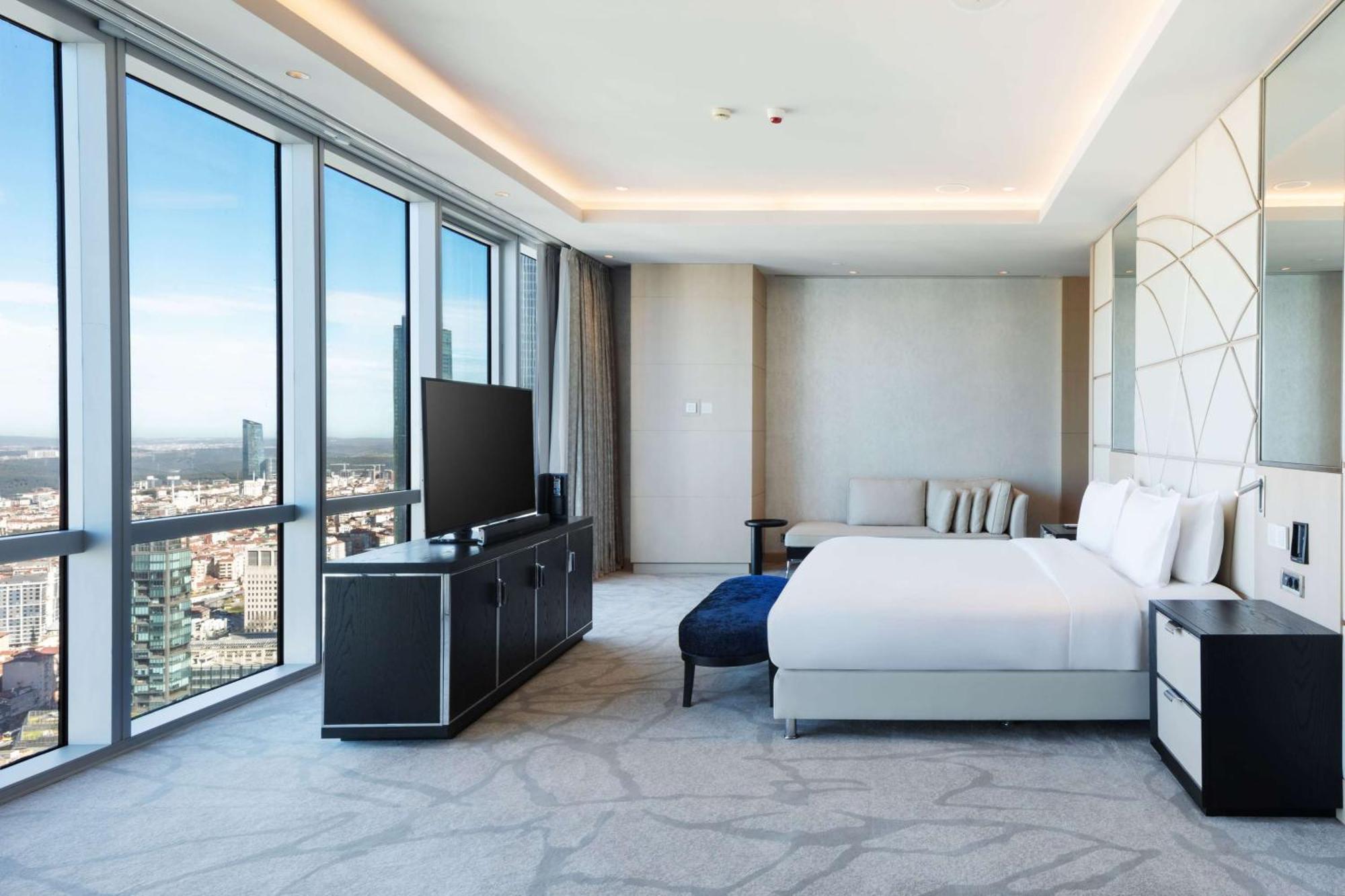 Wyndham Grand Istanbul Levent Hotel & Conference Center 伊斯坦布尔 外观 照片 A bedroom at the hotel